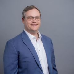 Porträtfoto von Chris Reich